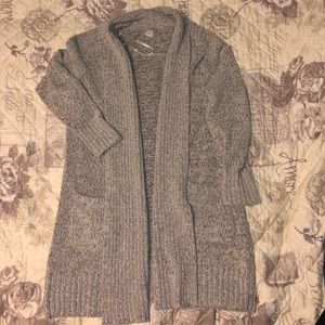 Warm and soft mid length cardigan. Size M